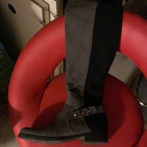 Gray and black boots